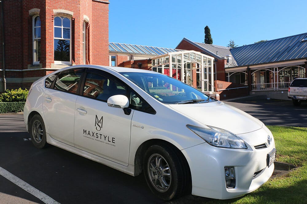 Max Style company vehicle parked in front of Catholic Diocese of Auckland