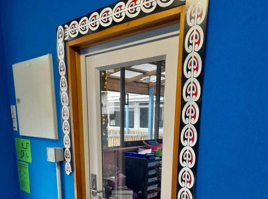 renovated classroom door with Autex walls